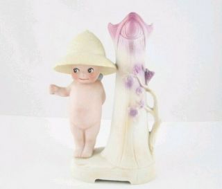 Adorable All Bisque Kewpie Farmer With Vase