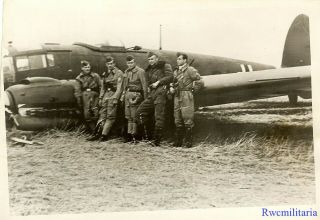 Press Photo: Best Luftwaffe Aircrew W/ Their Shot Down He - 111 Bomber; 1941