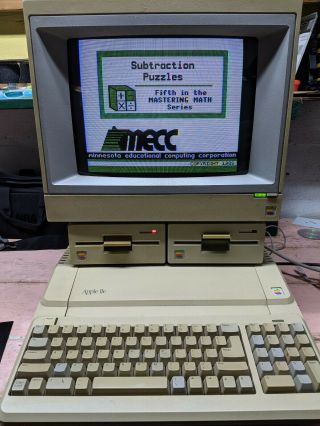 Vintage Apple IIe Computer with Monitor and 2 Floppy Drives - and 2