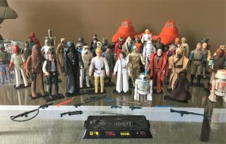 Vintage Star Wars.  First 12.  AFA Taiwan Boba Fett & Ship.  Weapons - 57 figures 12
