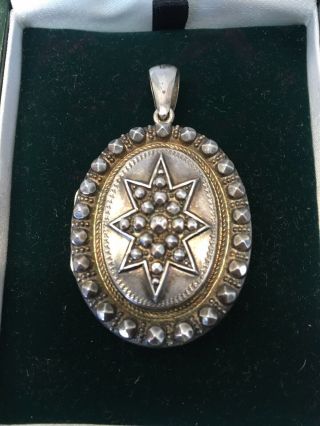 Antique Victorian Decorative Sterling Silver Oval Locket With Star Motif