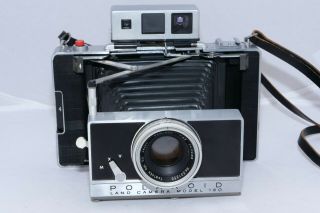 Vintage Polaroid 180 Instant film camera,  Lens shutter settings. 11