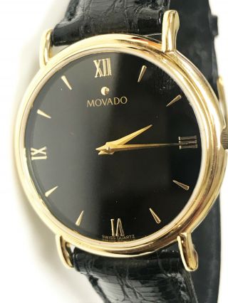 Movado 35.  5mm Vintage Quartz Swiss Gold - Tone Black Leather Band & Dial Watch