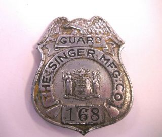 Vintage The Singer Mfg.  Co.  Guard 168 Badge
