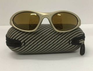 Vintage Oakley Minute Sunglasses.  Platinum Frame,  Gold Iridium Lenses