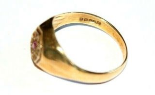 VINTAGE 9CT GOLD SIGNET RING WITH STAR DESIGN & NATURAL RUBY.  SIZE O. 4
