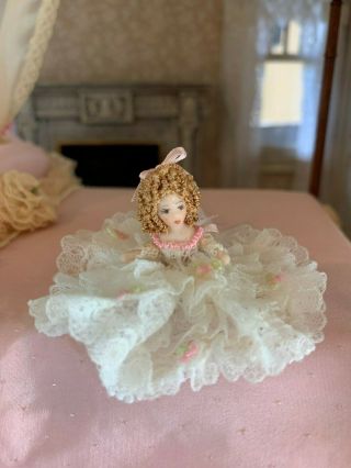 Vintage 1 " Miniature Dollhouse Porcelain Tiny Doll Sits On Bed Lace Pink White