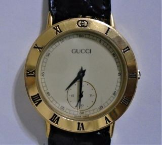 Gucci Watch 3000.  2 M Men’s Watch - Vintage Very Rare.  Gold Face.  with seconds 4