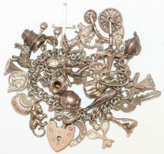 7.  5 " Loaded Vintage Sterling Silver Padlock Charm Bracelet,  Moving 25 Charms 66g