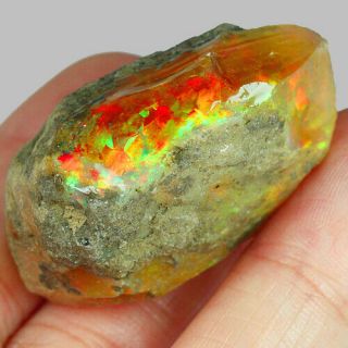 83.  8ct Natural Ethiopian Crystal Black Opal Play Of Color Rough Specimen Mysg671