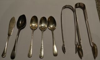 128 GRAMS OF SCRAP SILVER SUGAR TONGS,  SPOONS.  BUTTER KNIFE.  ALL HALLMARKED. 2