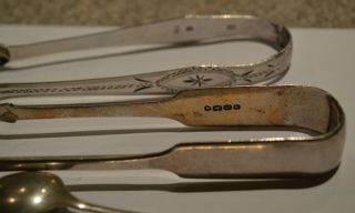 128 GRAMS OF SCRAP SILVER SUGAR TONGS,  SPOONS.  BUTTER KNIFE.  ALL HALLMARKED. 7