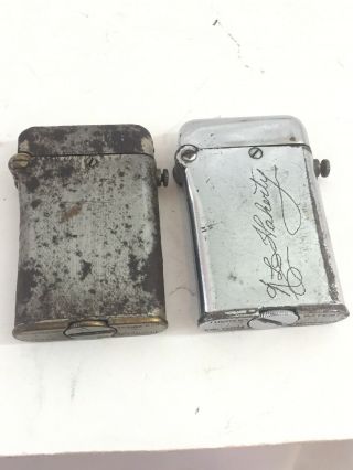 2 Well Loved Vintage Thorens Semi Automatic Double Claw Pocket Lighters