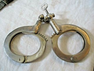 Vintage H & R Arms Handcuffs Pat.  1,  984,  677 W Key