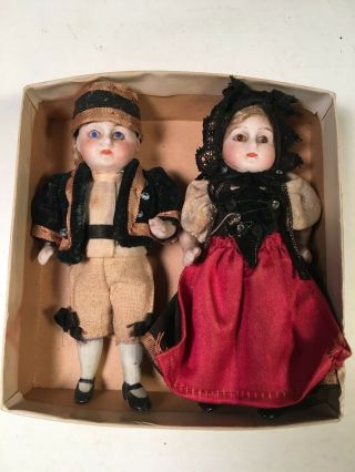 Antique Bisque Boy And Girl Dolls