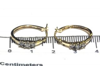14k yellow gold.  22ct I2 - 3 H round diamond hoop huggie earrings 2g vintage 4