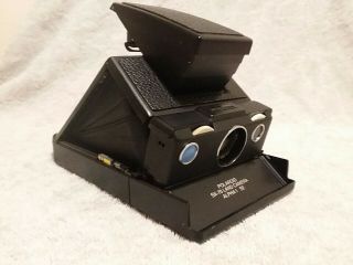 Vintage Polaroid SX - 70 Land Camera Alpha 1 SE,  Articulated Case,  Film. 2