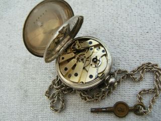 ANTIQUE SILVER ' KENDAL & DENT ' FOB WATCH WITH CHAIN AND KEY.  GOOD ORDER 5