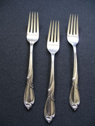 International Sterling Silver Rhapsody Table Ware: 3 Dinner Forks,