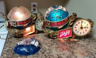 2 Vintage 1976 Schlitz Beer World Globe Motion Spinning Light Up Clocks Signs