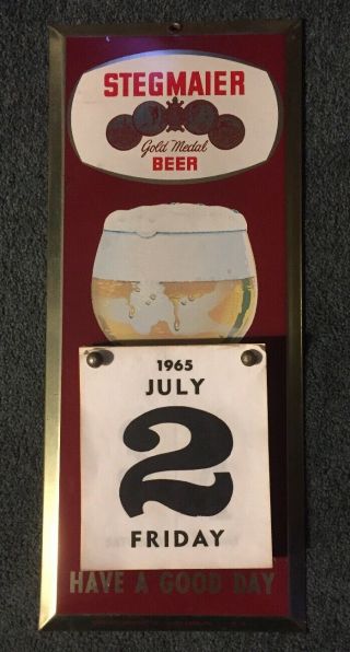 Vintage 1965 Stegmaier Beer Metal Toc Tin Over Cardboard Calendar Sign