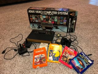 Vintage Atari 2600 Console With 4 Games And Accessories