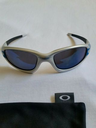 Authentic Vintage Oakley Straight Jacket Silver With Flames And Ice Iridium.