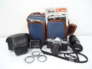 VINTAGE Asahi Pentax K1000 SLR Film Camera with Carry Bag and Various Lenses 2