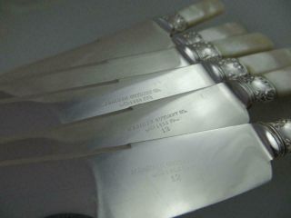 8 Dinner Knives Meriden Cutlery Mother of Pearl Handles Sterling Silver Band 6