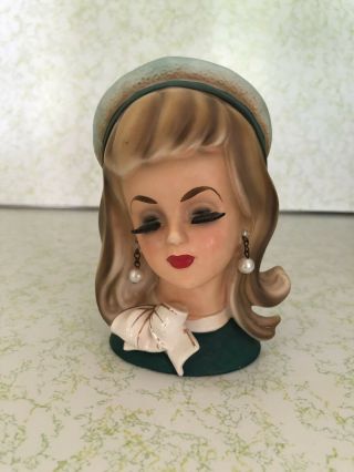 Vintage Lady Head Vase.  Japan.  Tan Hair,  Green Hat And Top.  Pearls,  White Bow.