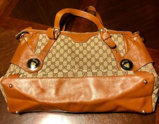 Large Vintage Authentic Gucci Canvas & Leather Gold - Plated Gucci Monogram Bag.