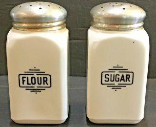 Vintage Set Of (2) Milk Glass Flour And Sugar Shakers With Tin Lids