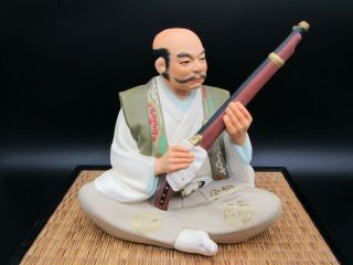 Vintage Japanese Hakata Urasaki Doll Ceramic Figurine Man Cleaning His Gun 2