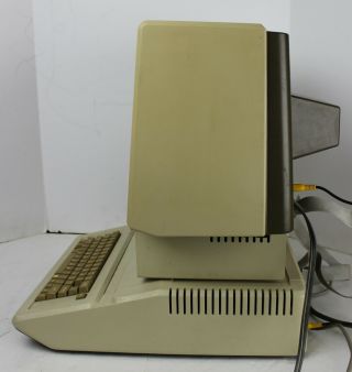 Vintage 1982 Apple IIe w/drives,  Apple III monitor tested/working,  floppies 2