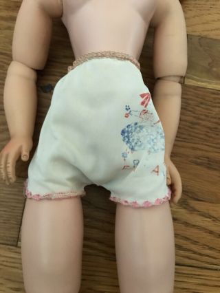 Vintage Madam Alexander Cissy doll with underwear and dress pattern. 3