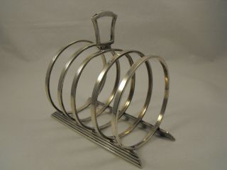 4 Slice Solid Silver Art Deco Toast Rack,  Birmingham 1939,  Hukin & Heath Ltd