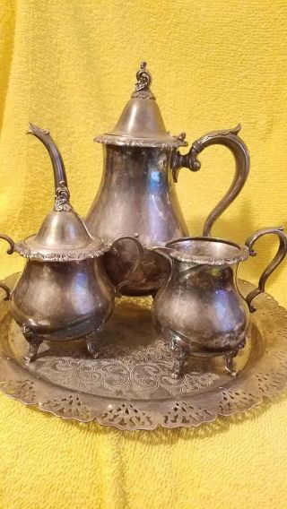 wm rogers & son silver plate tea set,  teapot,  creamer,  sugar bowl w/ lid,  tray 5