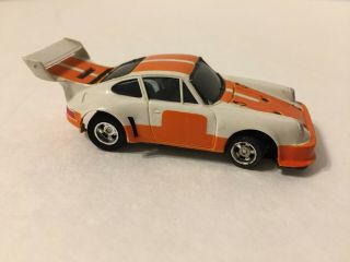 Vintage Aurora AFX Slot Car Orange White Porsche Turbo RSR Speedsteer Base 2