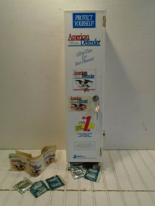 American Defender Condom Machine - Automatic Manufacturing Vintage Coin - Op