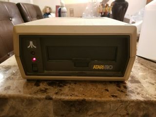 Vintage ATARI 810 Floppy Disk Drive with Power supply.  but powers on 2