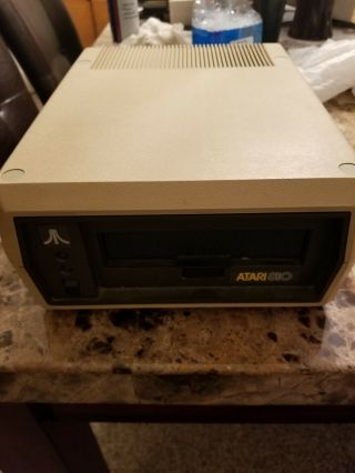 Vintage ATARI 810 Floppy Disk Drive with Power supply.  but powers on 4