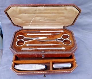 Antique Leather Cased Manicure Set With Silver Mounted Accessories.  Lon Hm 1926