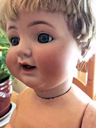 Simon & Halbig Doll 126: Bisque Head,  Open Mouth,  2 Teeth,  Movable Tongue,