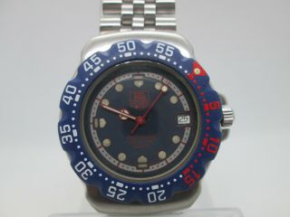 Vintage Tag Heuer F1 Stainless Steel Quartz Mens Watch (blue/red)