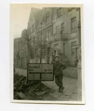 Photo Of German Road Sign Aachen.  With Gi Posing