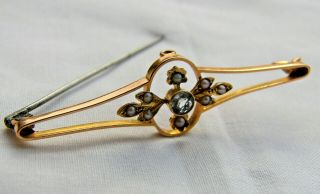 A Lovely Edwardian 15ct Gold Brooch Set With Seed Pearls And Clear Stone
