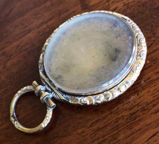 An Antique 19th Century Unmarked Yellow Metal Mourning Locket.  “In Memory Of”. 2