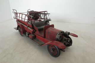Vintage Model of an Antique Fire Truck made of cast metal and very detailed 3