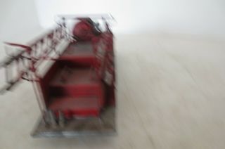 Vintage Model of an Antique Fire Truck made of cast metal and very detailed 5