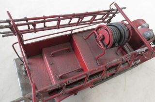 Vintage Model of an Antique Fire Truck made of cast metal and very detailed 6